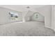 Spacious bedroom with two windows allowing for natural light at 990 Lilac Arbor Rd, Dacula, GA 30019