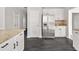 Eat-in kitchen featuring granite counters, stainless appliances, and dark hardwood floors at 990 Lilac Arbor Rd, Dacula, GA 30019