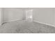 Bright and spacious living room with neutral carpet at 990 Lilac Arbor Rd, Dacula, GA 30019