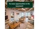 Spacious basement living area with exposed ceiling, neutral furniture, and ample natural light at 1354 Benbrooke Nw Ln, Acworth, GA 30101