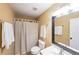 Bathroom featuring a shower-tub combination and a mirror over the sink at 1354 Benbrooke Nw Ln, Acworth, GA 30101