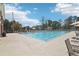Community pool area with lounge chairs and umbrellas offering a relaxing recreational space at 1354 Benbrooke Nw Ln, Acworth, GA 30101