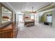 Serene main bedroom featuring tray ceilings, neutral tones, and a cozy sitting area at 1354 Benbrooke Nw Ln, Acworth, GA 30101