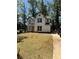 New construction features a charming two-story home with a well-manicured front yard and a classic architectural design at 3089 Corbin Ave, Decatur, GA 30034