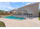 Inviting backyard featuring a private pool, covered patio, and well-maintained landscaping for relaxation at 4360 Carver Ct, Cumming, GA 30040