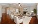 Bright and airy living room with fireplace, hardwood floors, and modern furnishings at 4360 Carver Ct, Cumming, GA 30040