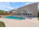 Bright daytime shot of the backyard pool and patio area, showing the perfect outdoor entertaining space at 4360 Carver Ct, Cumming, GA 30040