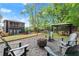 Backyard with seating, fire pit, gazebo, and lush landscaping at 479 Clifton Se St, Atlanta, GA 30316