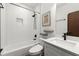 Stylish bathroom featuring a tub with a white subway tile surround and modern fixtures and decor at 479 Clifton Se St, Atlanta, GA 30316