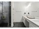 Stylish bathroom with dual sinks, modern shower, and sleek fixtures at 479 Clifton Se St, Atlanta, GA 30316