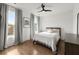 Bright bedroom with hardwood floors, a ceiling fan, and large windows with natural light at 479 Clifton Se St, Atlanta, GA 30316