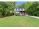 Charming two-story home with a well-manicured lawn and inviting front porch at 479 Clifton Se St, Atlanta, GA 30316