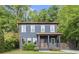 Inviting two-story home with a covered front porch and beautifully landscaped yard at 479 Clifton Se St, Atlanta, GA 30316