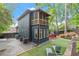 Two story home with screened in porch, deck, and manicured lawn at 479 Clifton Se St, Atlanta, GA 30316