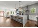 Spacious kitchen with a large island, stainless appliances, and open layout to the living area at 479 Clifton Se St, Atlanta, GA 30316