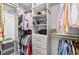 Organized walk-in closet with shelves, drawers, and hanging space for clothes and accessories at 479 Clifton Se St, Atlanta, GA 30316