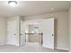 Bedroom with neutral carpet, white walls, two doors and a partial view of the second floor at 4970 Roseman Trl, Cumming, GA 30040