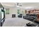 Open floor plan with the kitchen connected to the living room with a fireplace at 4970 Roseman Trl, Cumming, GA 30040