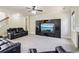 Comfortable living room featuring built-in entertainment center and fireplace at 4970 Roseman Trl, Cumming, GA 30040