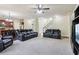Spacious living room with a ceiling fan and open floor plan at 4970 Roseman Trl, Cumming, GA 30040