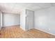 A finished basement area with wood-look flooring and closet at 6841 Fairway Ridge Dr, Douglasville, GA 30134
