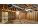 Unfinished basement with exposed utilities at 6841 Fairway Ridge Dr, Douglasville, GA 30134