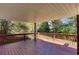Exterior wooden deck with wooden railing and wooded backyard views at 6841 Fairway Ridge Dr, Douglasville, GA 30134