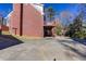 Side exterior featuring a brick facade and a multi-level deck space at 6841 Fairway Ridge Dr, Douglasville, GA 30134