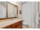 Bathroom featuring a vanity, a framed mirror and white tiling at 893 Paces Farm Sw Trl, Marietta, GA 30064