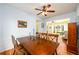 Inviting dining area with hardwood floors offers ample space for entertaining at 3545 River Summit Trl, Duluth, GA 30097