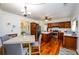 Spacious kitchen with wood cabinets, stainless appliances, and a central island at 3545 River Summit Trl, Duluth, GA 30097