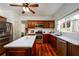 Bright kitchen showcases stainless appliances, an island, and ample counter space at 3545 River Summit Trl, Duluth, GA 30097