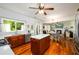 Modern kitchen boasts island, stainless appliances, and easy access to dining and living rooms at 3545 River Summit Trl, Duluth, GA 30097