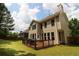 Exterior of house overlooking an expansive backyard with a deck perfect for outdoor enjoyment at 36 Evergreen Way, Dallas, GA 30157