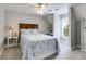 Well-lit bedroom with desk, large bed, and an abundance of natural light at 36 Evergreen Way, Dallas, GA 30157