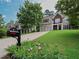 Charming two-story home with a well-manicured lawn and inviting curb appeal at 36 Evergreen Way, Dallas, GA 30157