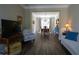 Open-concept living room featuring hardwood floors and a view into the dining area at 36 Evergreen Way, Dallas, GA 30157