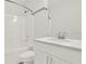 Clean bathroom featuring a shower over bath combination with a single sink at 6859 Winding Wade Trl, Austell, GA 30168