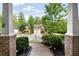 View from the front porch of neighboring houses and lush landscaping at 6859 Winding Wade Trl, Austell, GA 30168