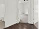 View into a bathroom and bedroom, each having neutral interiors at 6859 Winding Wade Trl, Austell, GA 30168