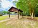 Outdoor community pavilion area near green space and tennis courts at 1528 Buckingham Pl, Stockbridge, GA 30281