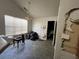 View of a living room in need of repair and updating at 1528 Buckingham Pl, Stockbridge, GA 30281