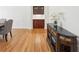 Dining room with hardwood floors and a built-in cabinet for storage at 1670 Bookhout Dr, Cumming, GA 30041
