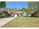 Charming single-Gathering home with well-manicured lawn and inviting curb appeal at 1670 Bookhout Dr, Cumming, GA 30041