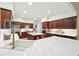 Modern kitchen featuring stainless appliances, island, and white countertops at 1670 Bookhout Dr, Cumming, GA 30041