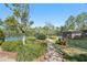 Well-maintained community tennis courts surrounded by lush greenery, providing a scenic and active recreation space at 1670 Bookhout Dr, Cumming, GA 30041