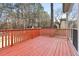 Decking with a view of the wooded surroundings and greenery at 2317 Rocksram Ct, Buford, GA 30519