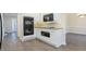 Modern kitchen featuring white cabinets, stainless steel appliances, and granite countertops at 2317 Rocksram Ct, Buford, GA 30519