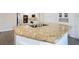 Kitchen island with granite countertop and undermount sink at 2317 Rocksram Ct, Buford, GA 30519