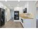 Kitchen featuring white cabinets, stainless steel appliances, and granite countertops at 2317 Rocksram Ct, Buford, GA 30519